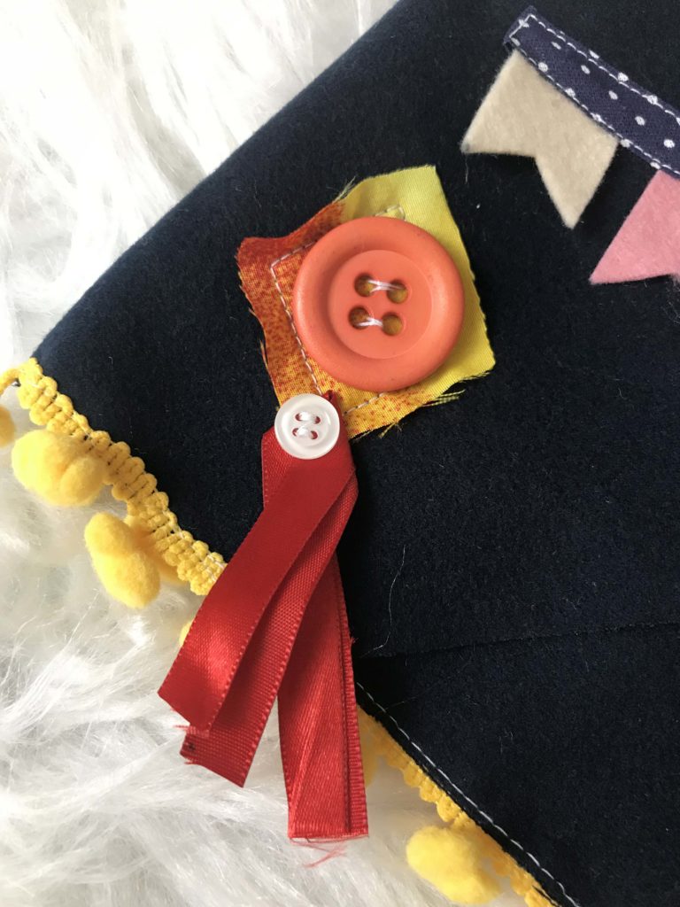 botão decorativo para customizar o colete de festa junina.